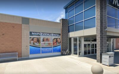 Mapleview Dental Centre window ad outside of Mapleview Mall